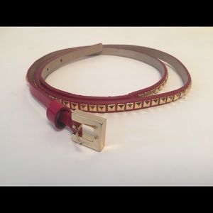 Gold studded red leather belt